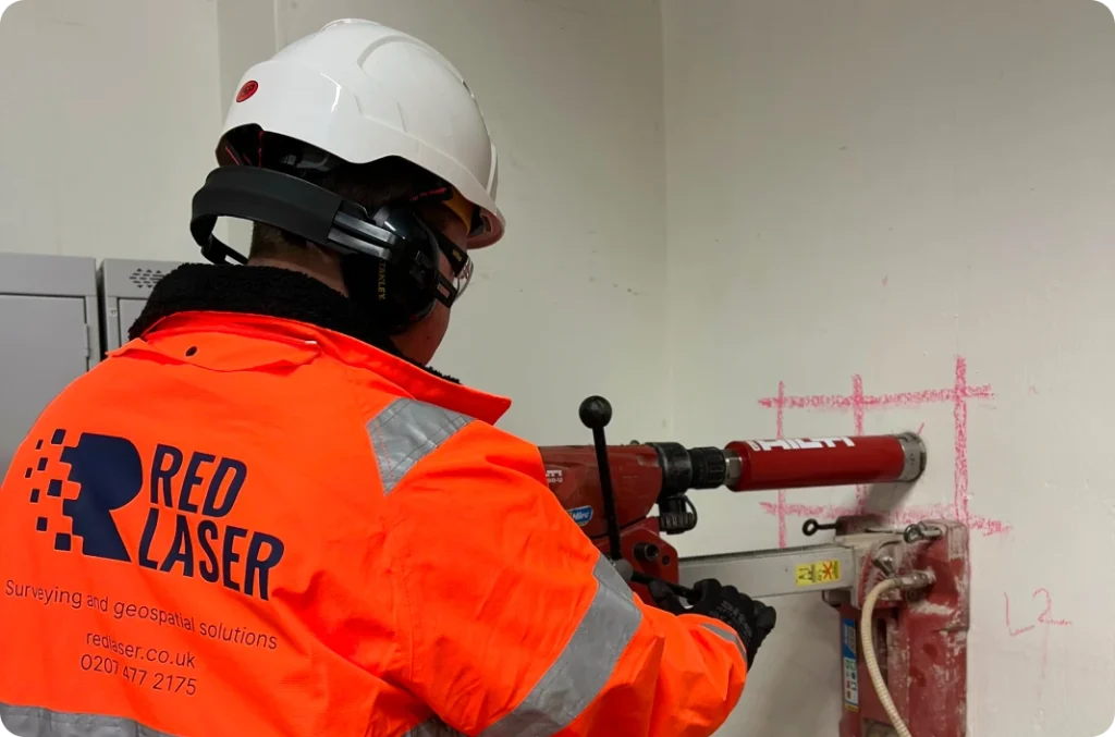 Technician in London performing diamond drilling with advanced equipment